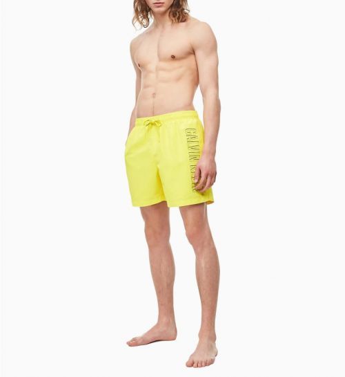 Pánske plavecké šortky KM0KM00381-ZAM žltá - Calvin Klein žltá L