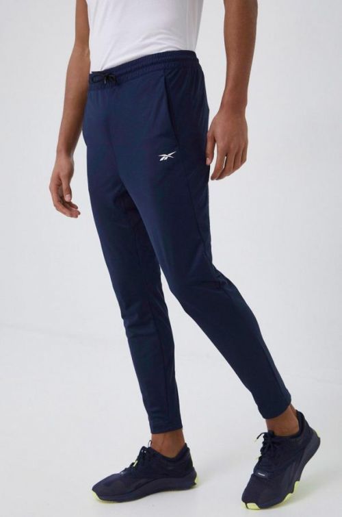Tepláky Reebok pánske, tmavomodrá farba, jednofarebné