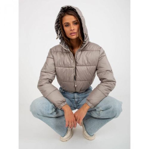 Dark beige reversible quilted jacket with an animal pattern