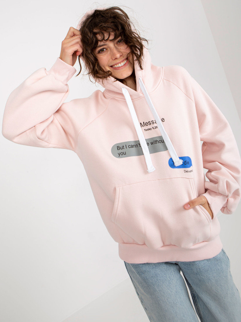 Light pink sweatshirt with an oversize print