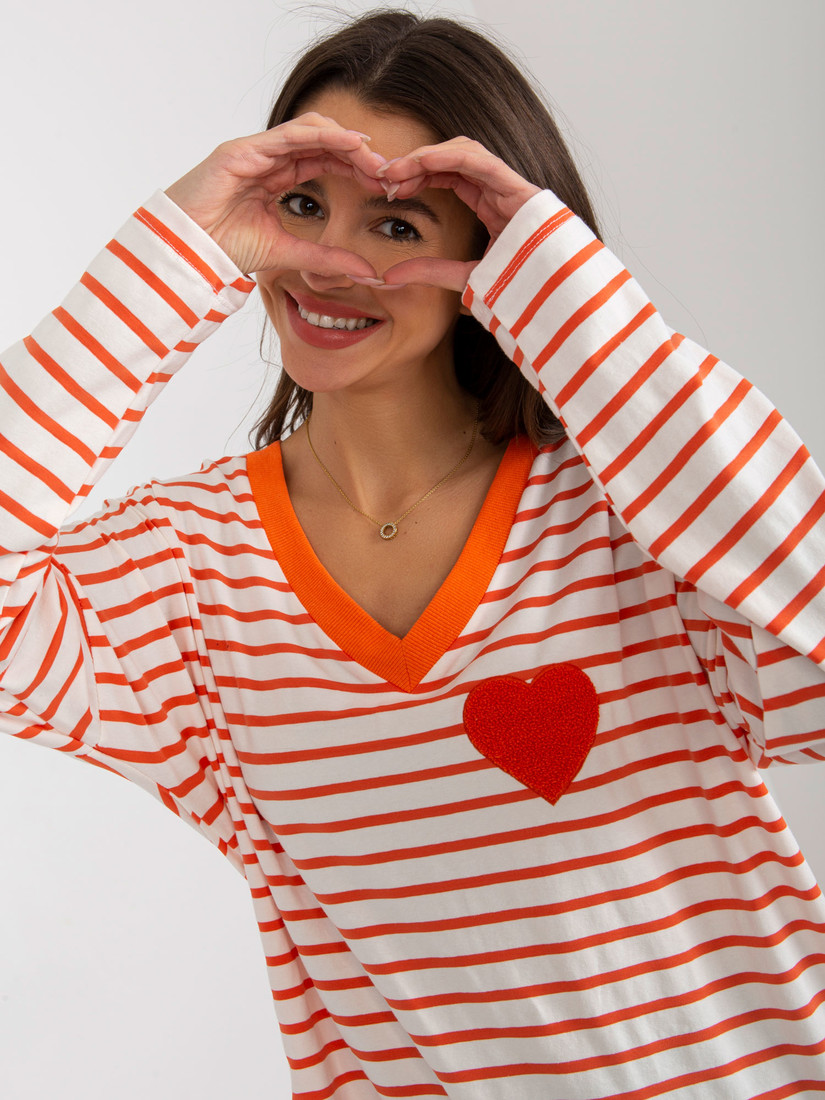 Orange and white loose striped blouse with a neckline