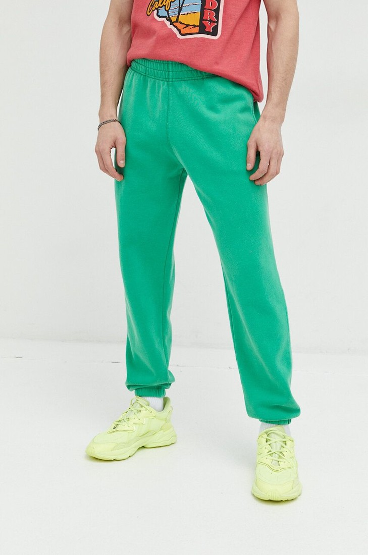 Tepláky Superdry zelená farba, jednofarebné