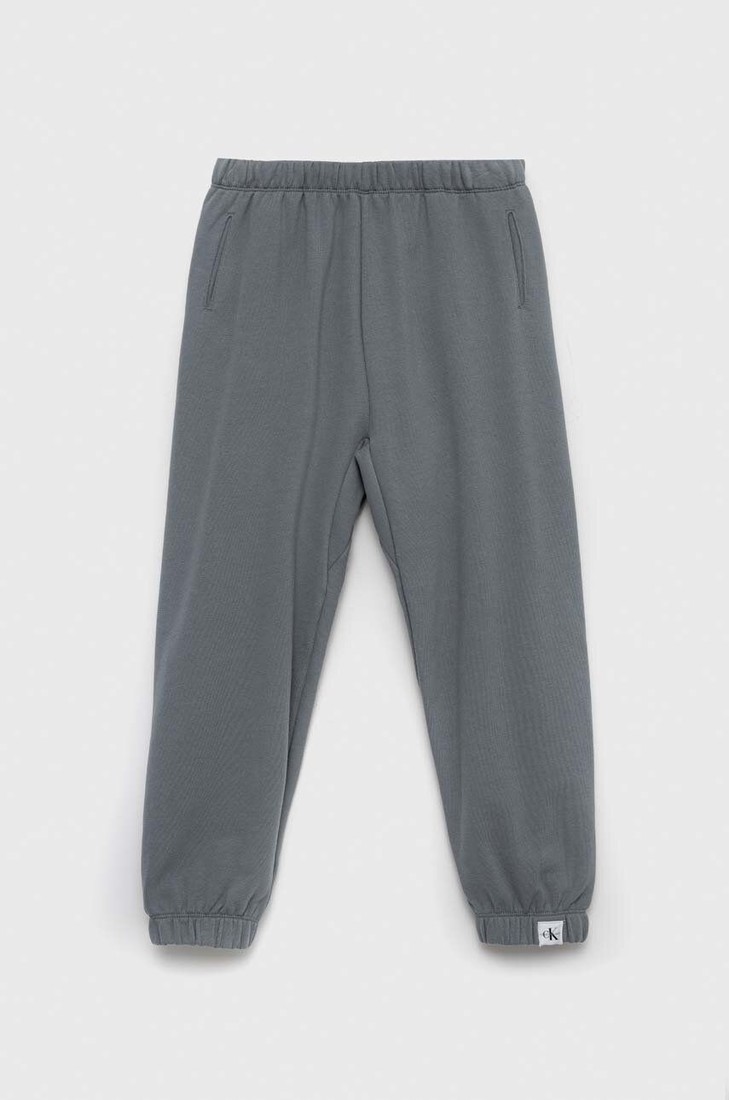Detské tepláky Calvin Klein Jeans šedá farba, jednofarebné