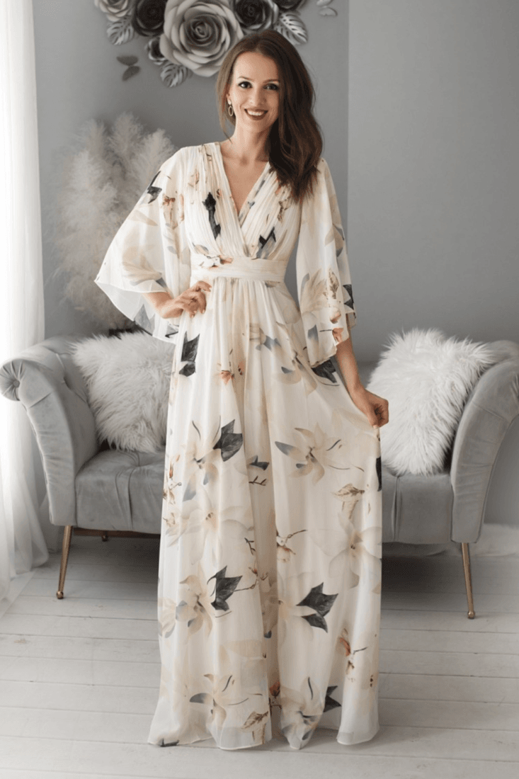 Smotanové kvetinové šaty s voľnými rukávmi Veľkosť: S