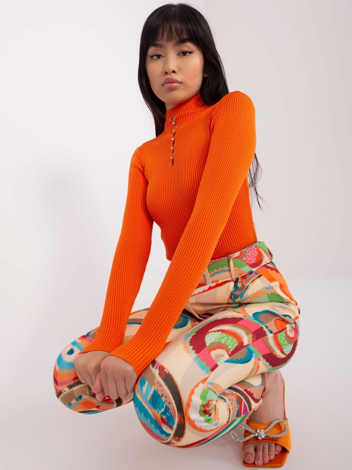 Orange fitted turtleneck blouse