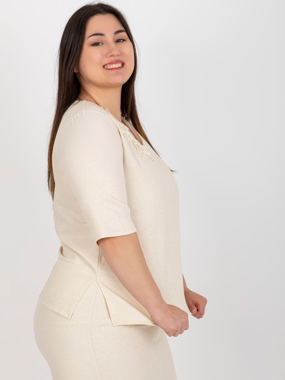 Beige blouse of larger size with short sleeves