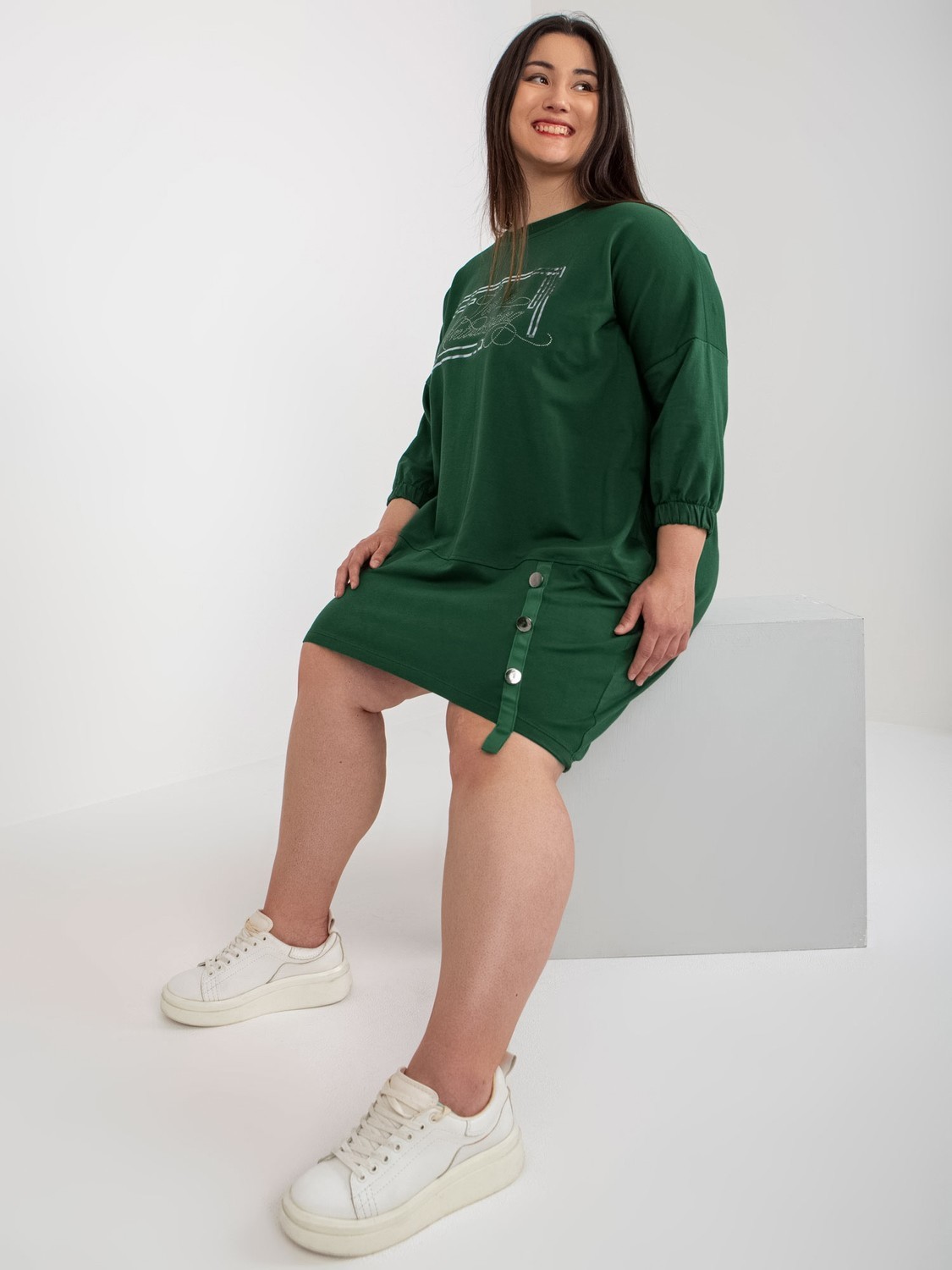Dark green dress of larger size with 3/4 sleeves