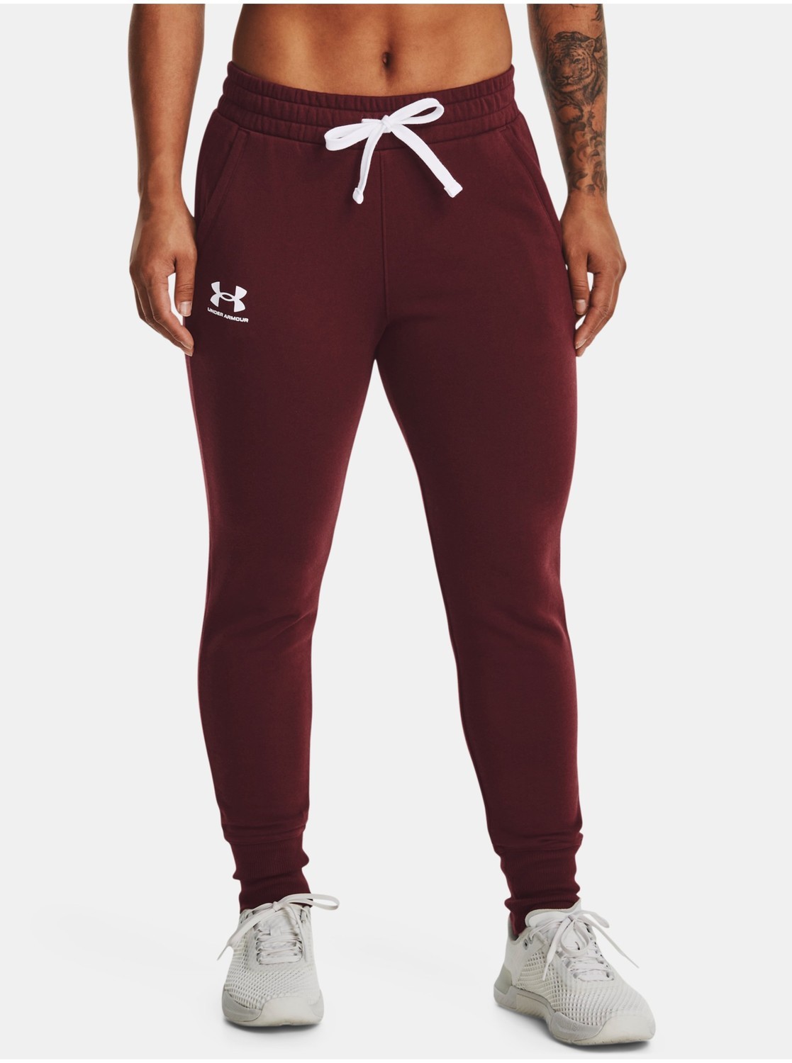 Nohavice a kraťasy pre ženy Under Armour - červená