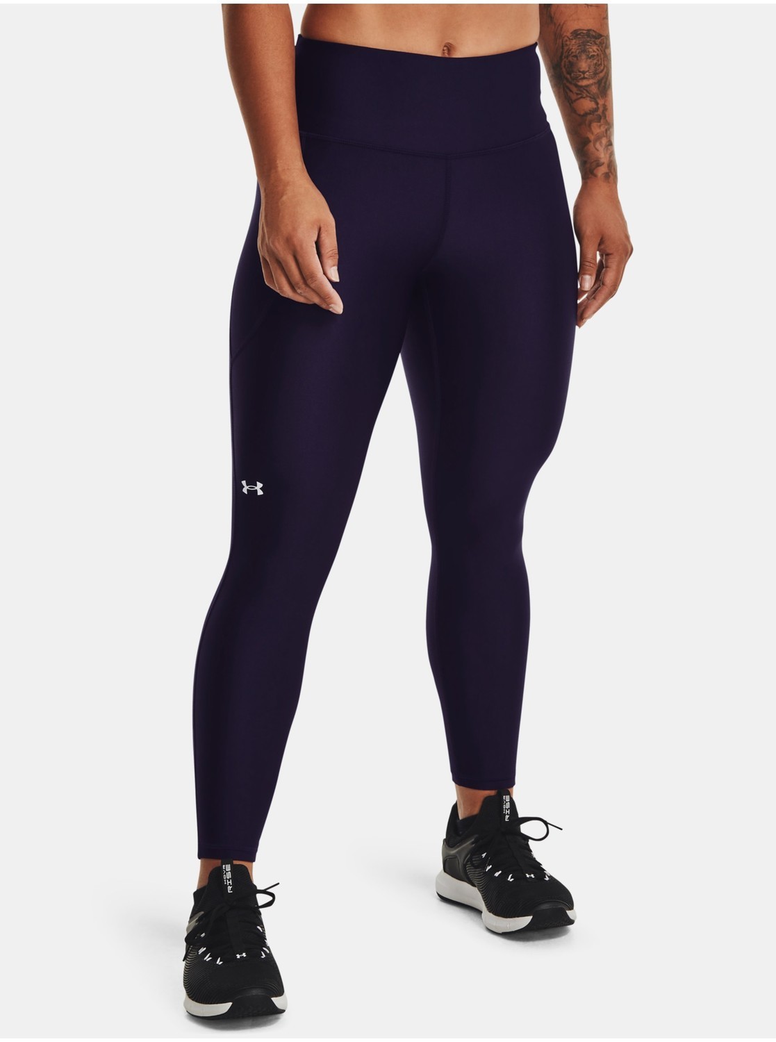 Nohavice a kraťasy pre ženy Under Armour - fialová