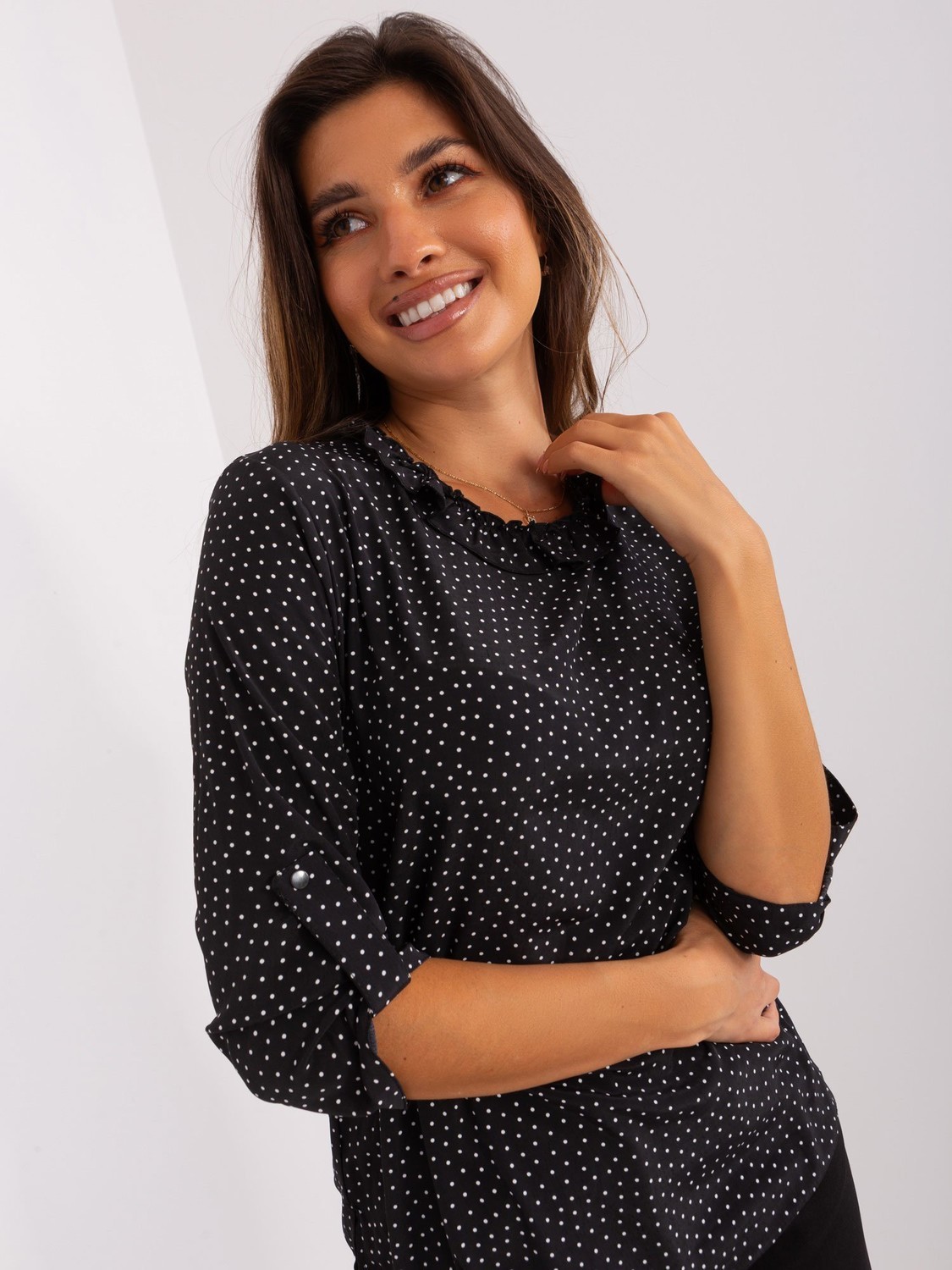 Black formal blouse with frills at neckline