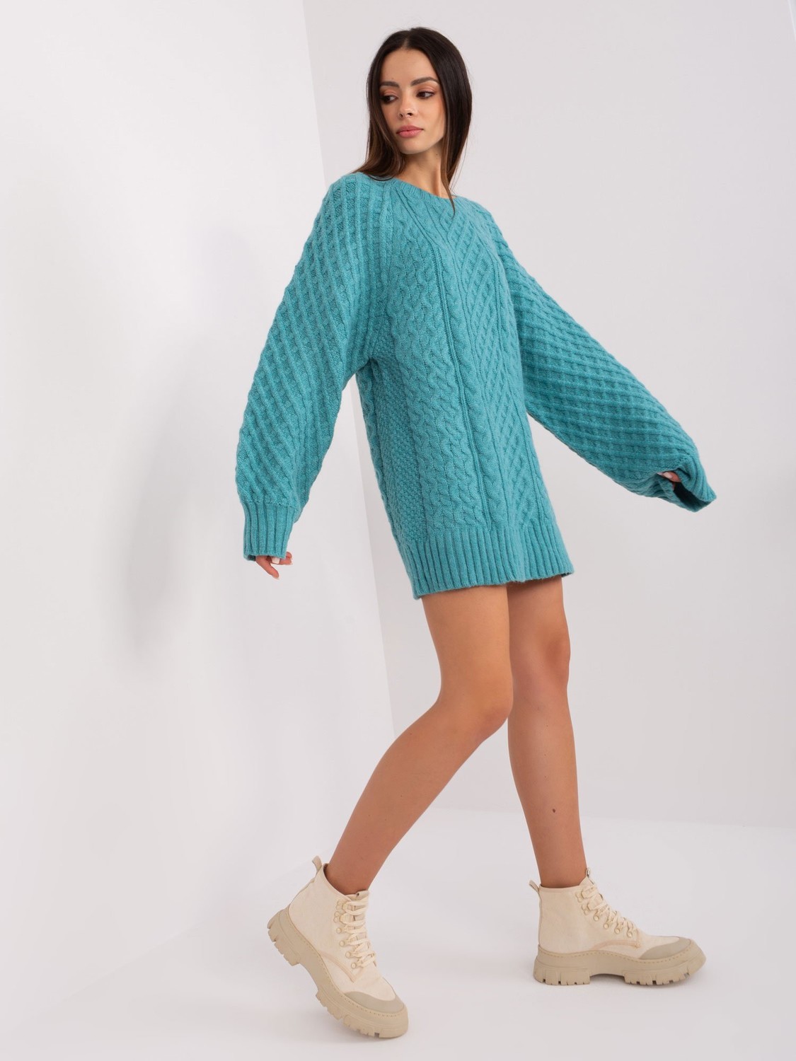 Turquoise knitted dress with cables