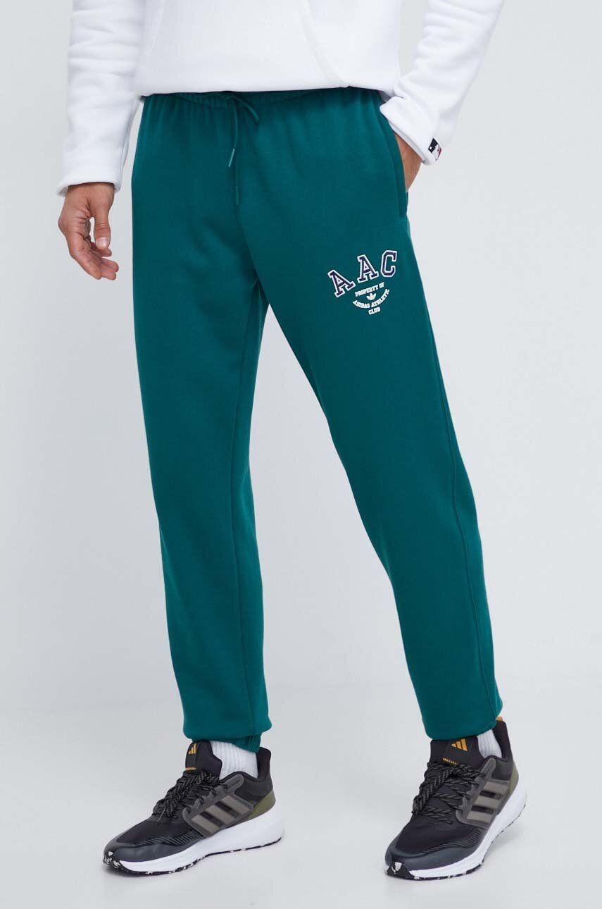 Bavlnené tepláky adidas Originals zelená farba, s nášivkou