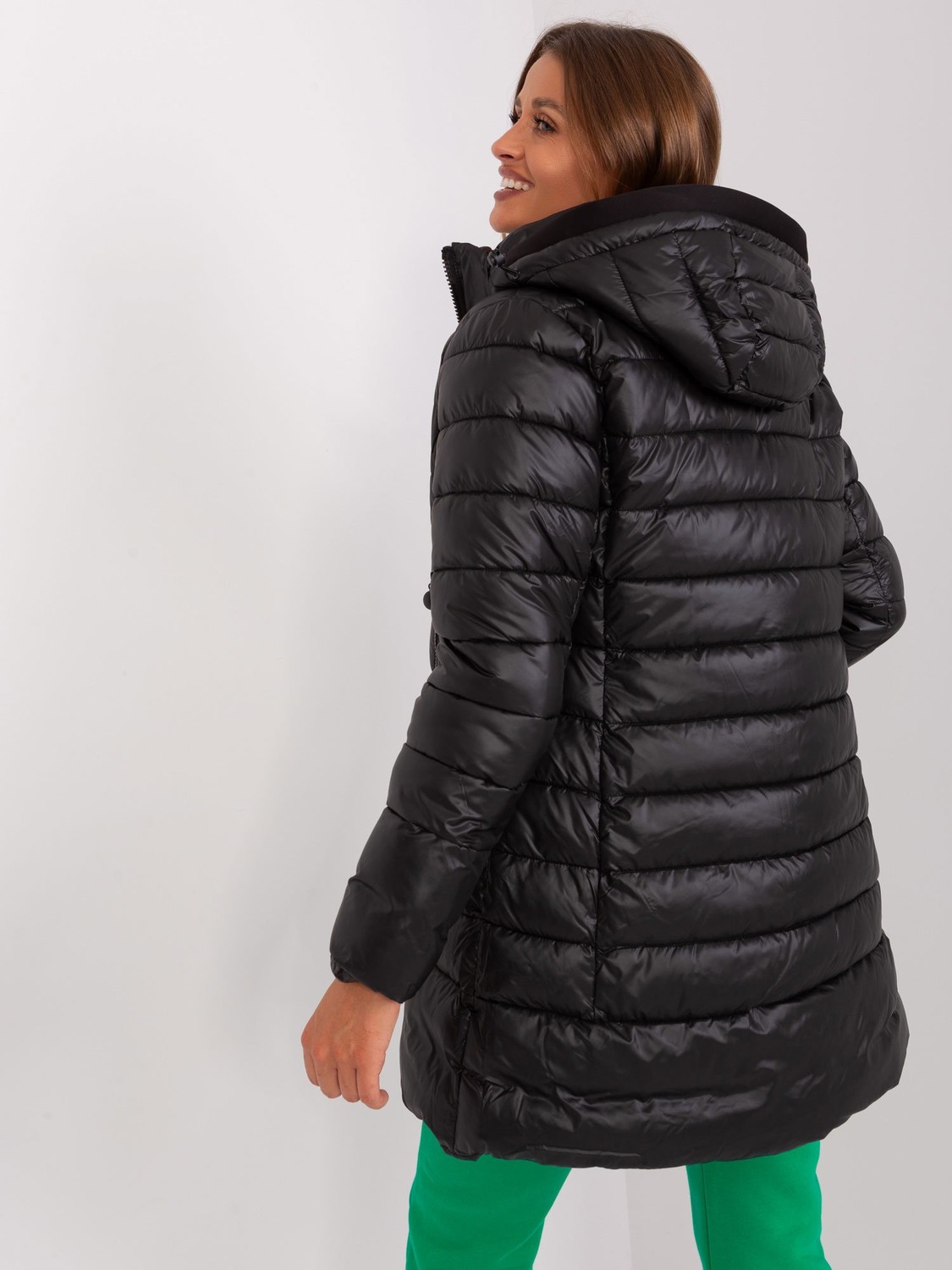 Black quilted winter jacket with pockets