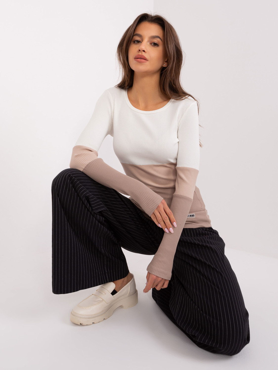 Ecru-beige basic blouse with a round neckline