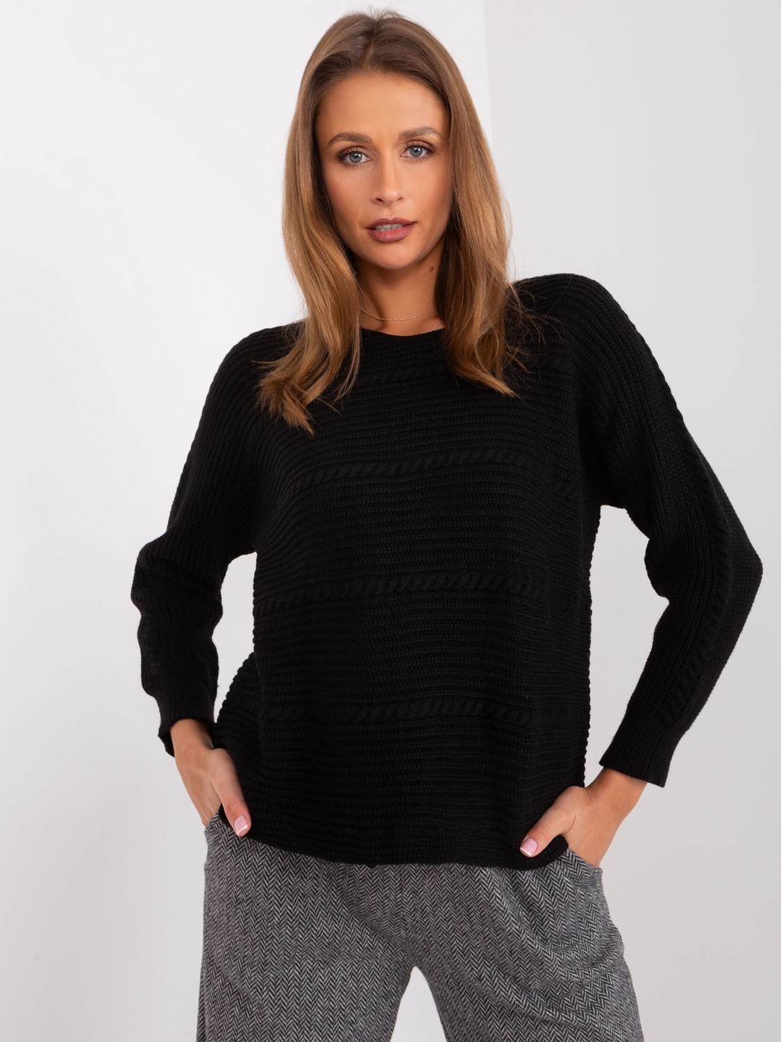 Black women's classic sweater with braids