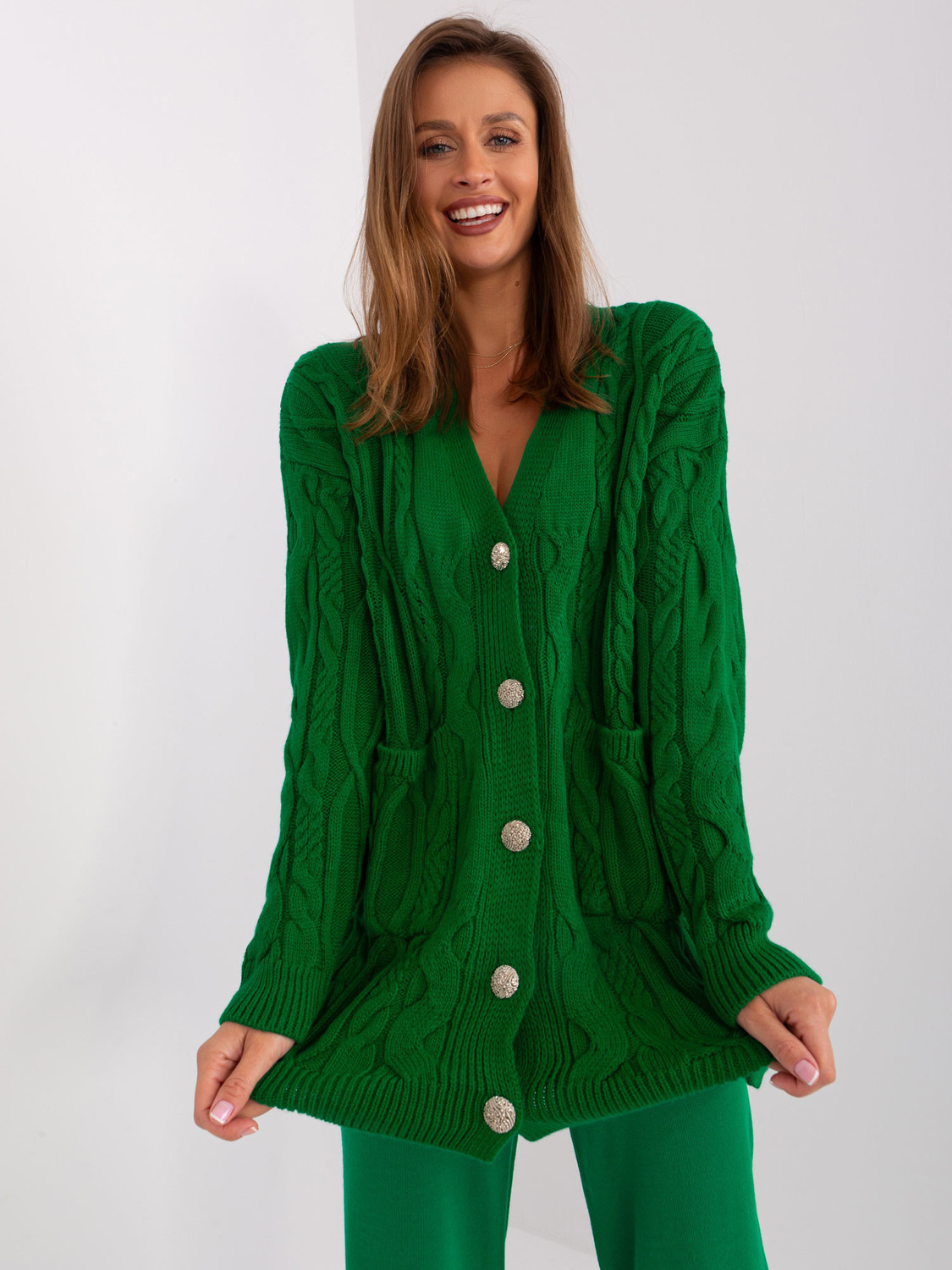 Green cardigan with cables