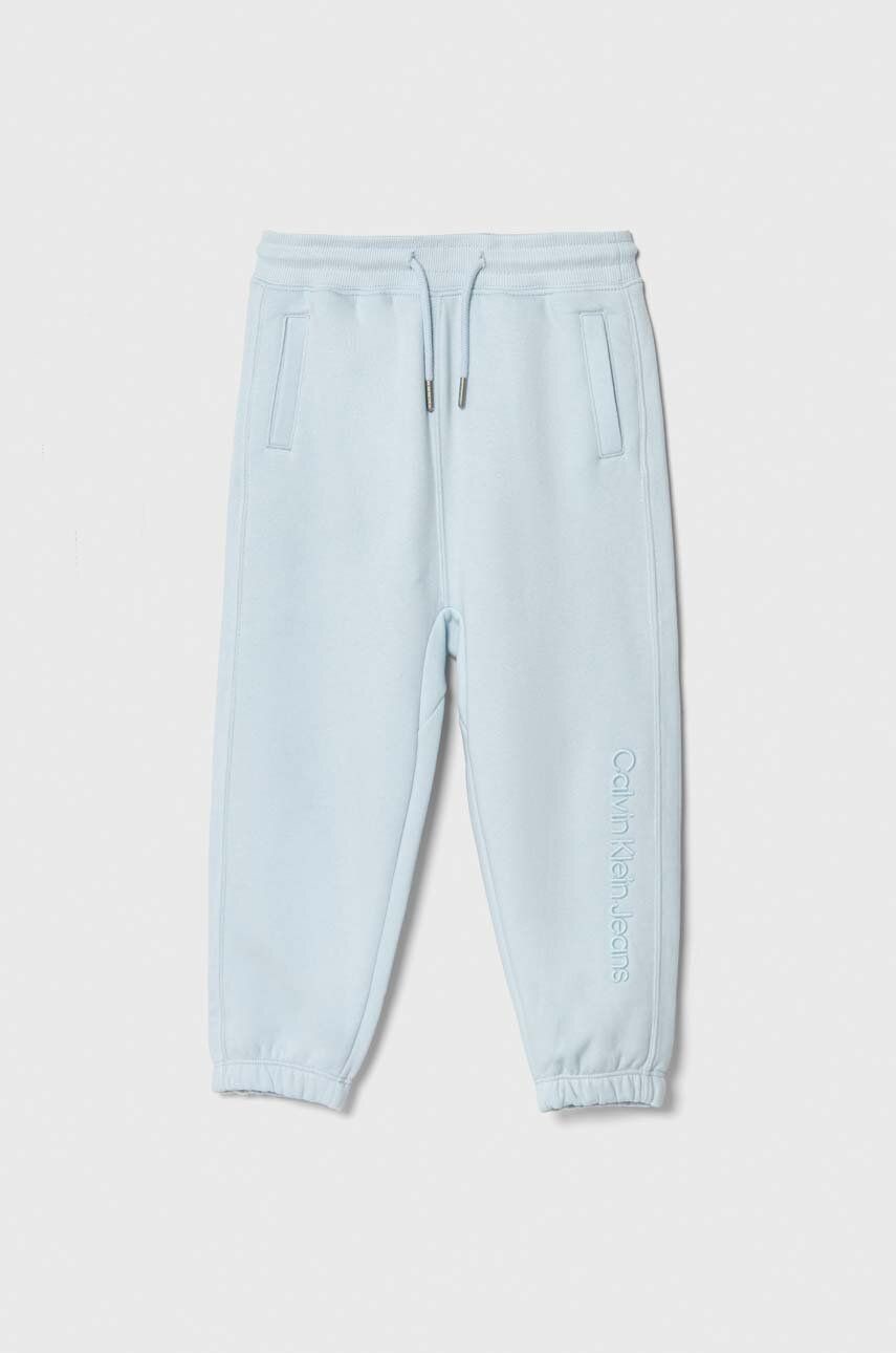 Detské tepláky Calvin Klein Jeans s nášivkou
