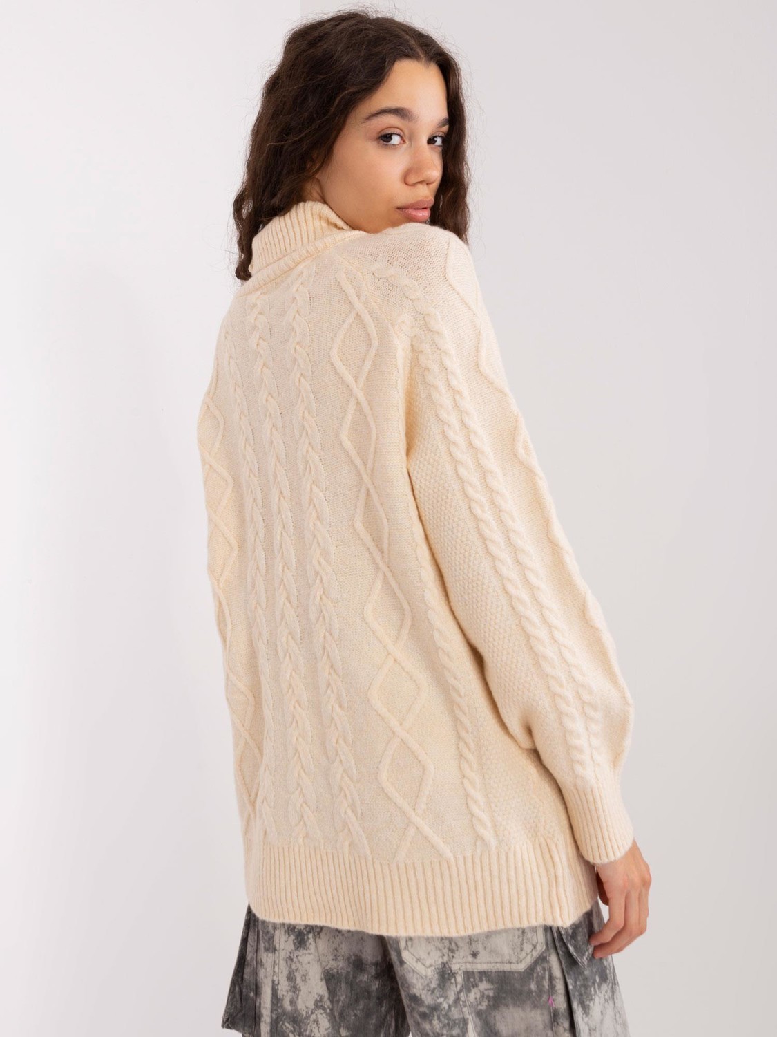 Light beige oversize sweater with cables
