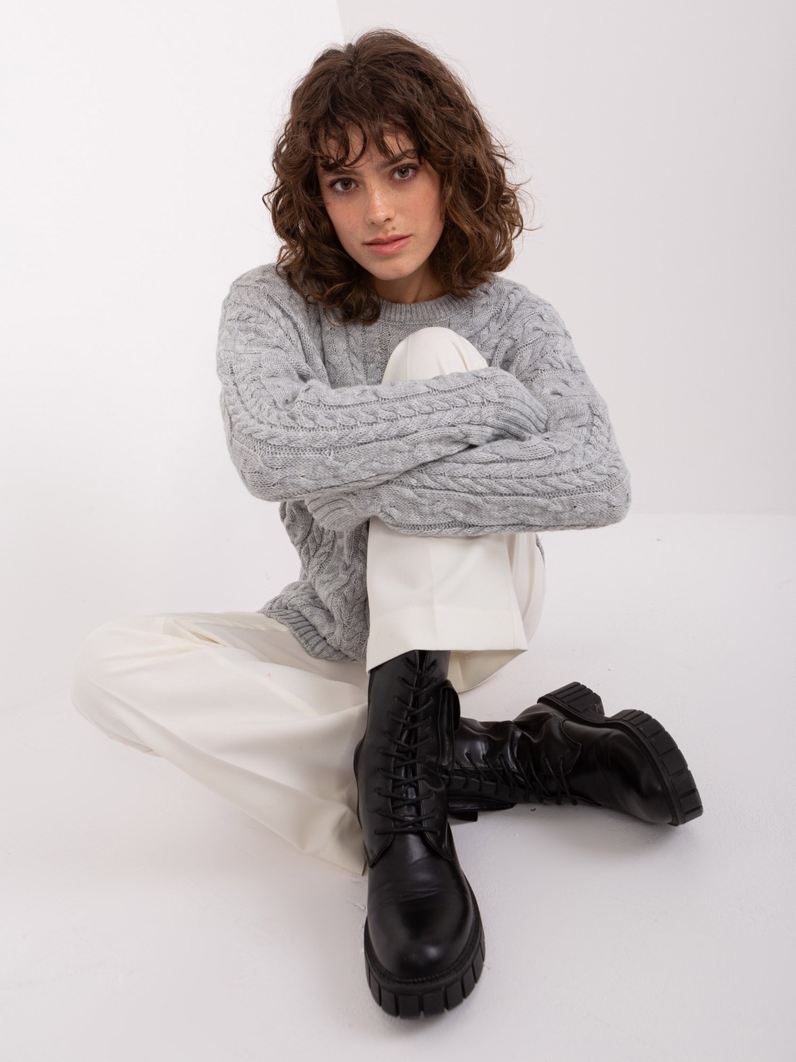 Gray sweater with cables and wool