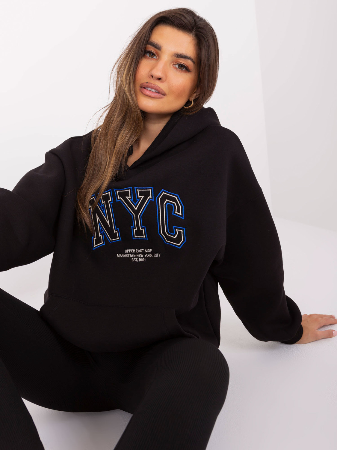 Black kangaroo sweatshirt with lettering and insulation