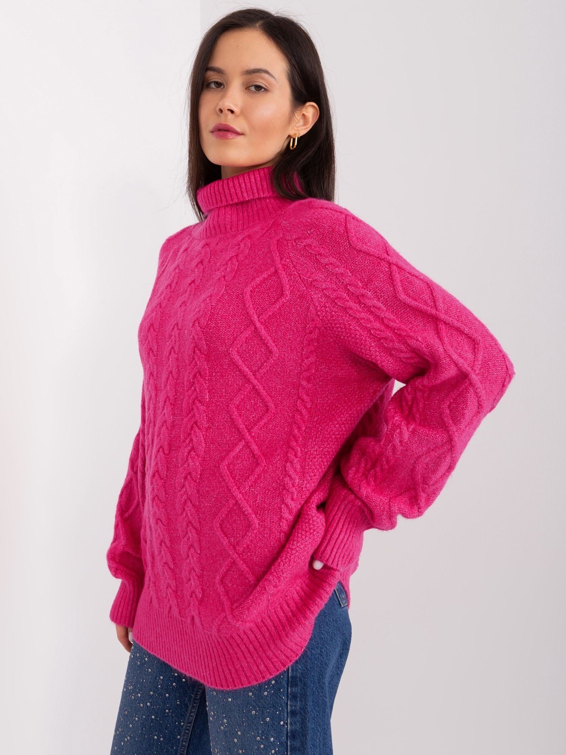Fuchsia sweater with cables and cuffs