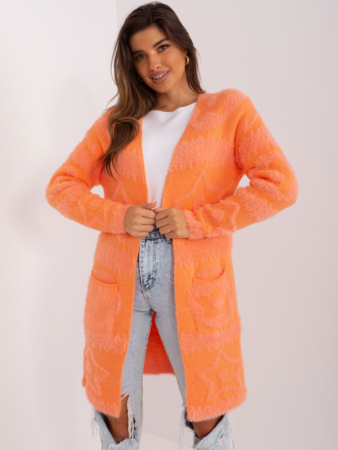 Orange women's cardigan with patterns