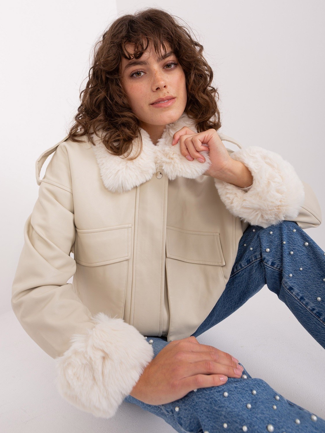 Light beige women's winter jacket with pockets