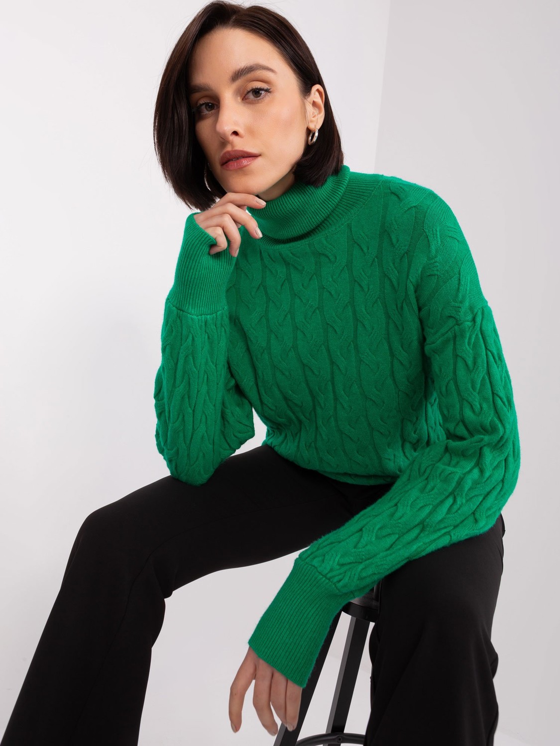 Women's green turtleneck with braids
