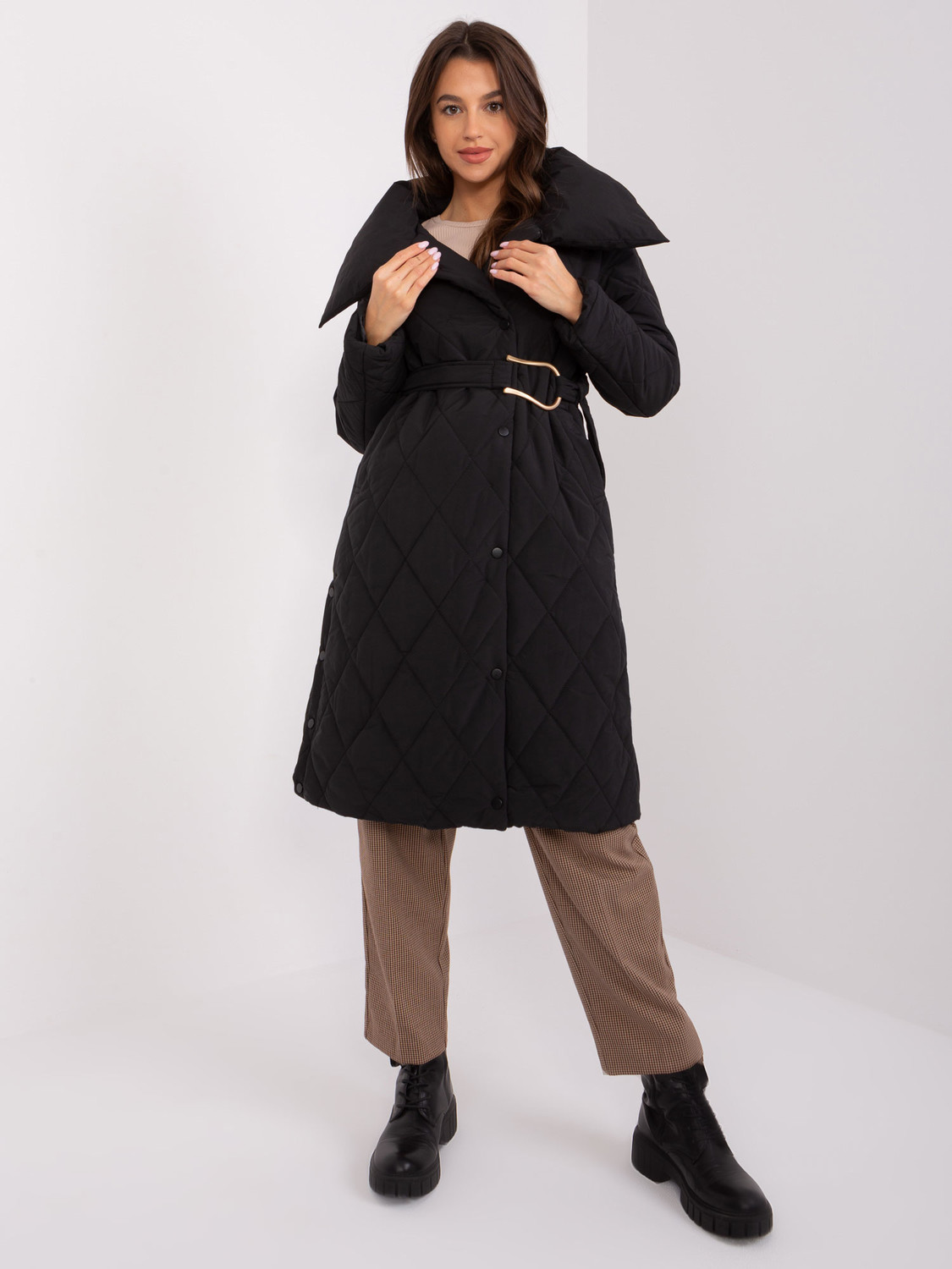 Black quilted winter jacket with belt