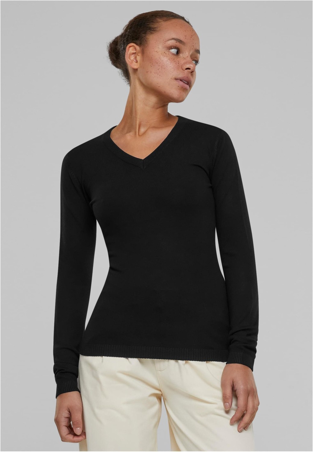 Women's knitted sweater with a V-neck in black