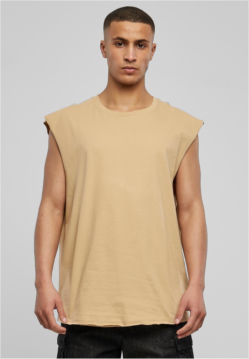 Open sleeveless T-shirt in beige