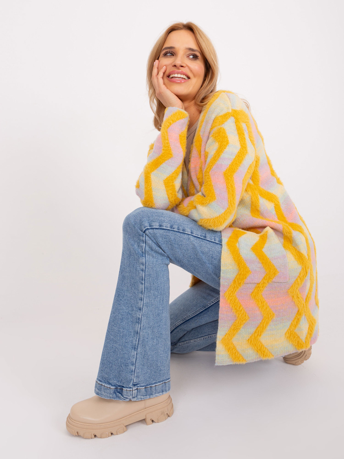 Yellow cardigan with geometric patterns