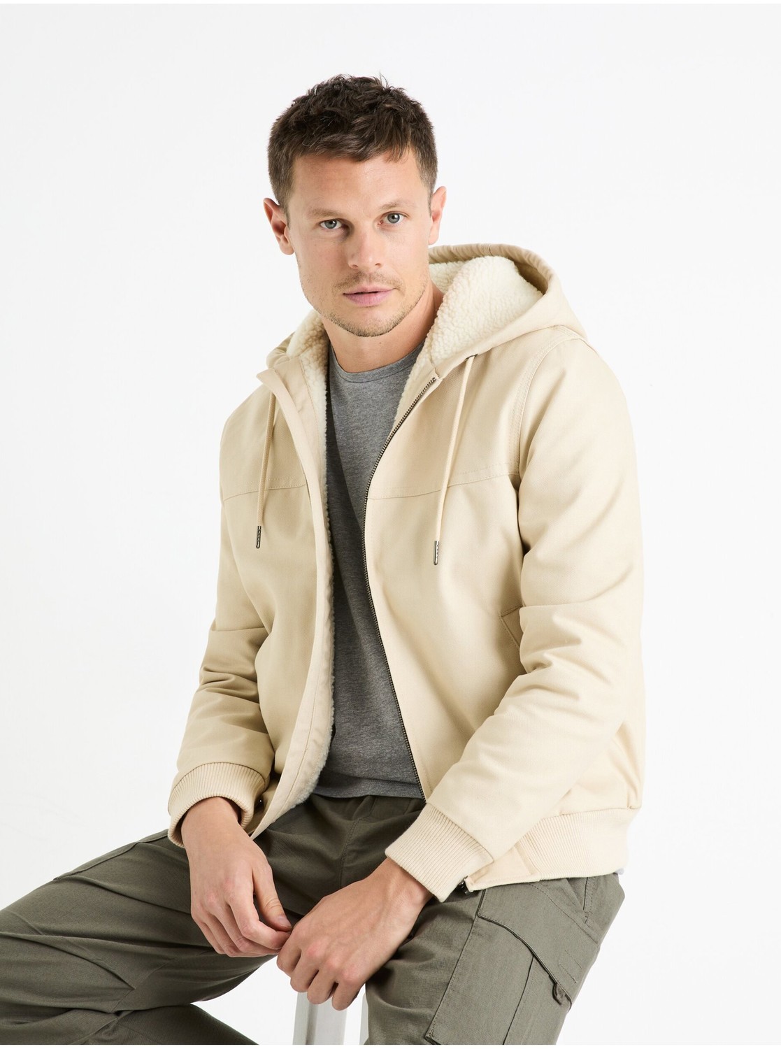 Krémová pánska bunda s umelým kožúškom Celio Fuhoodie