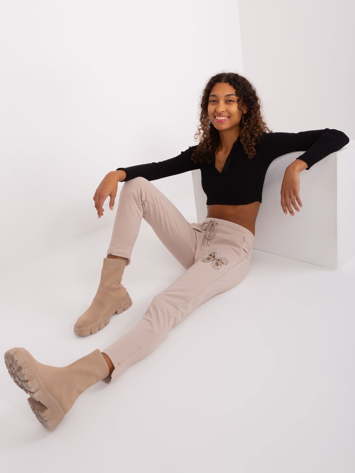 Light beige sweatpants with cut-outs