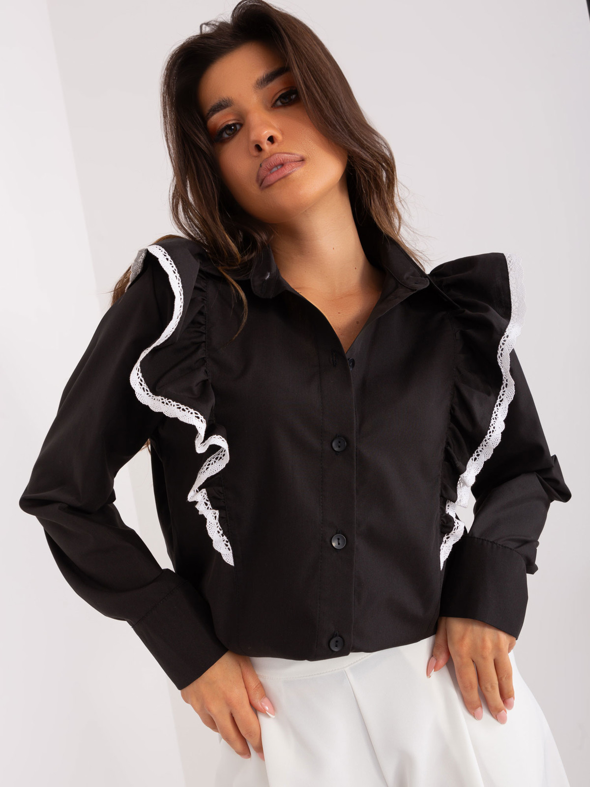 Black women's shirt with decorative ruffle