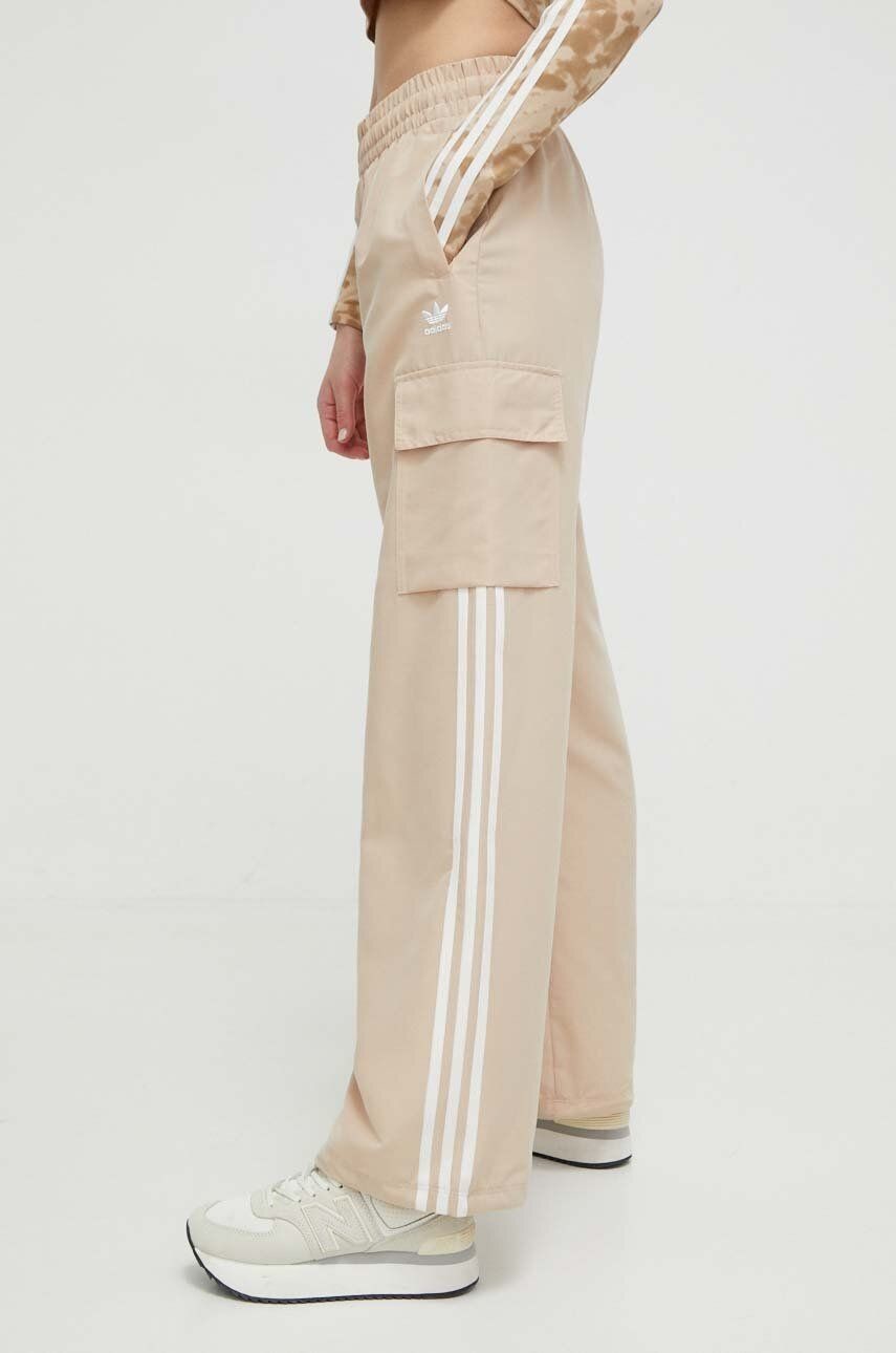 Tepláky adidas Originals béžová farba