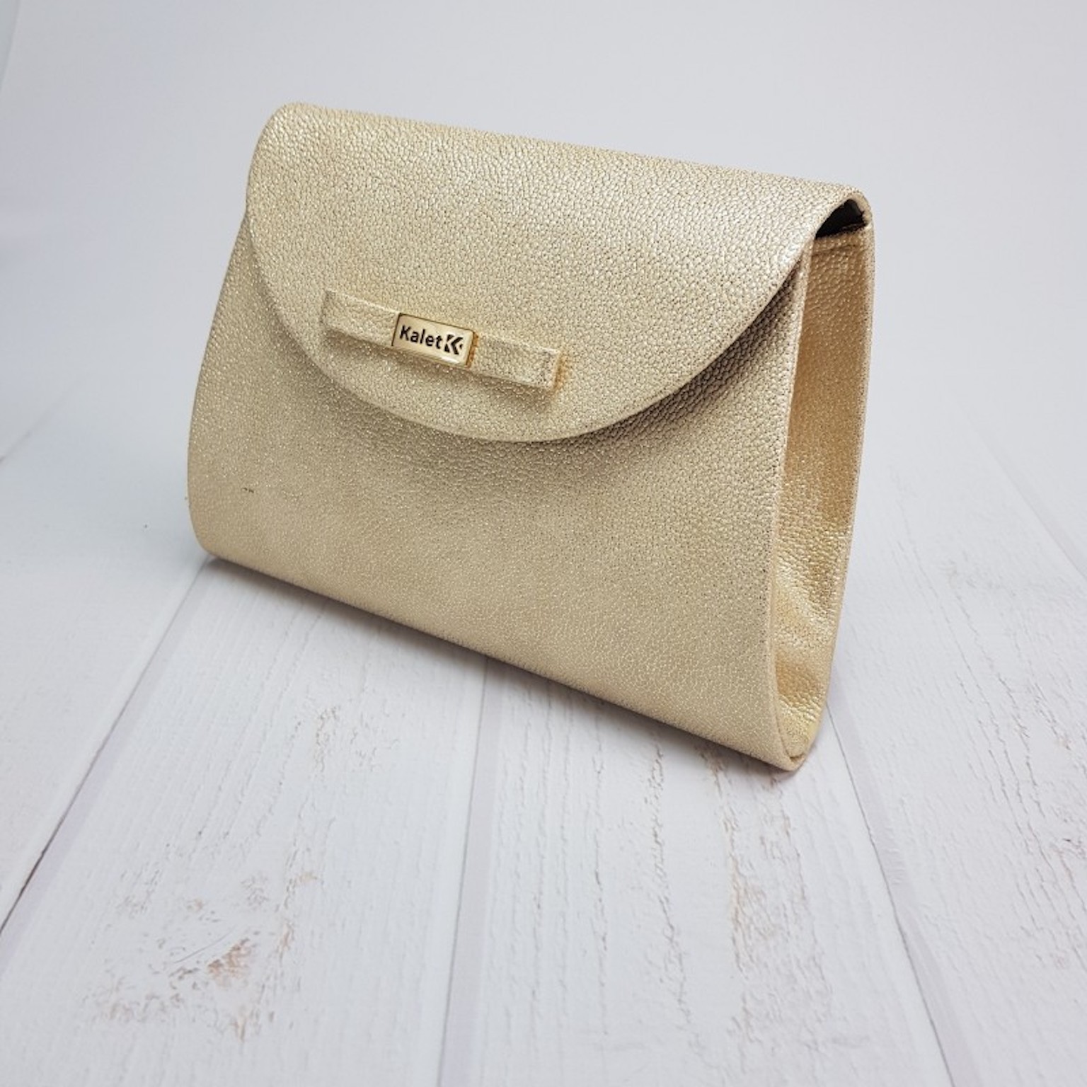 Zlatá trblietavá kabelka