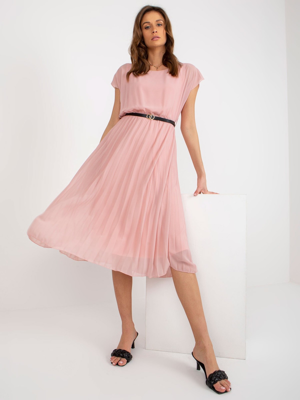 Light pink pleated dress with black belt