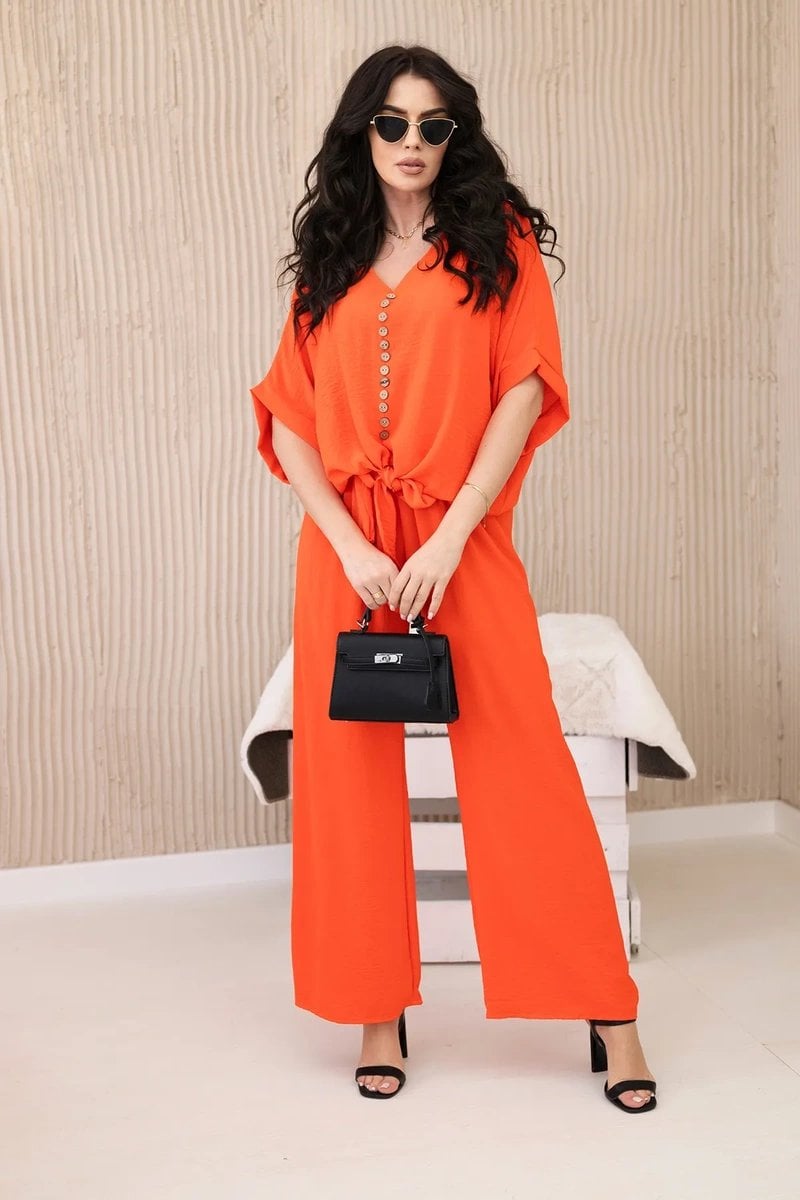 Set of blouses with orange trousers
