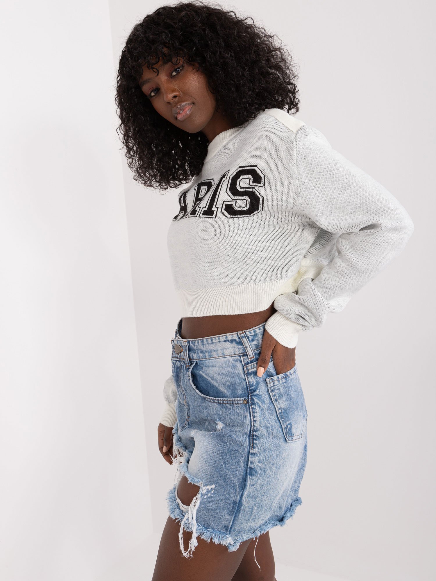 Ecru short oversize sweater with a round neckline