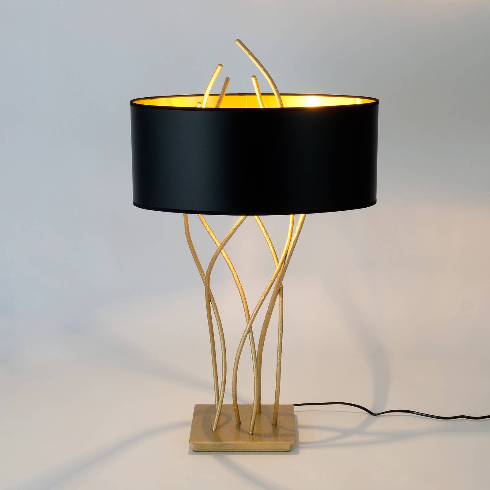 Oválna stolová lampa Elba, zlatá/čierna, výška 75 cm, železo