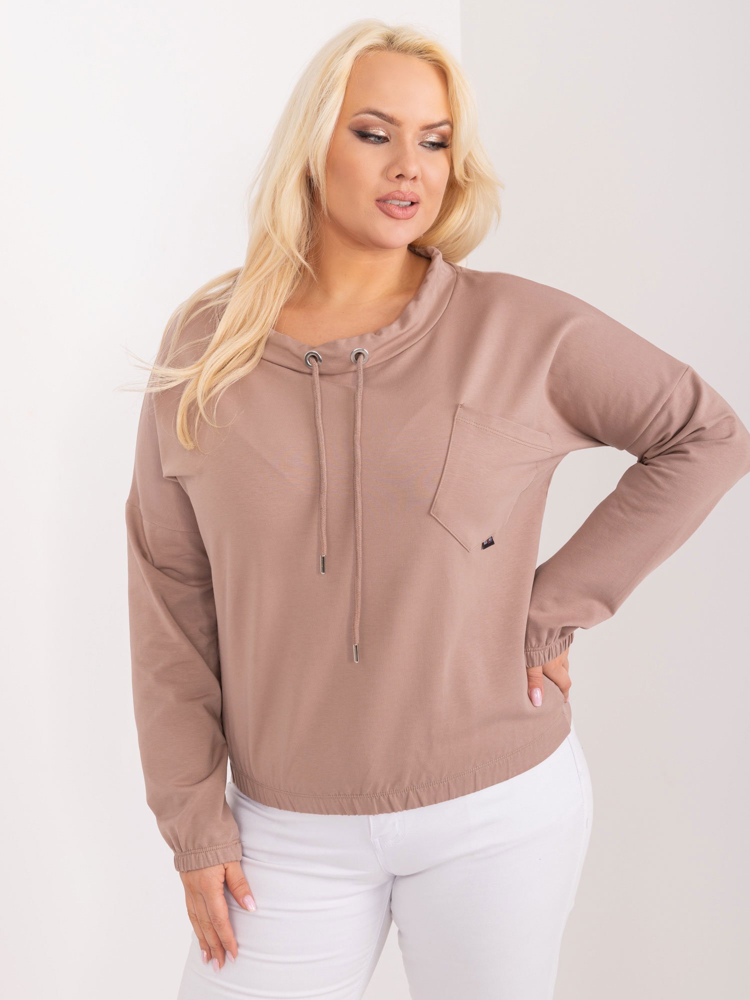 Light brown solid color blouse of a larger size with a pocket
