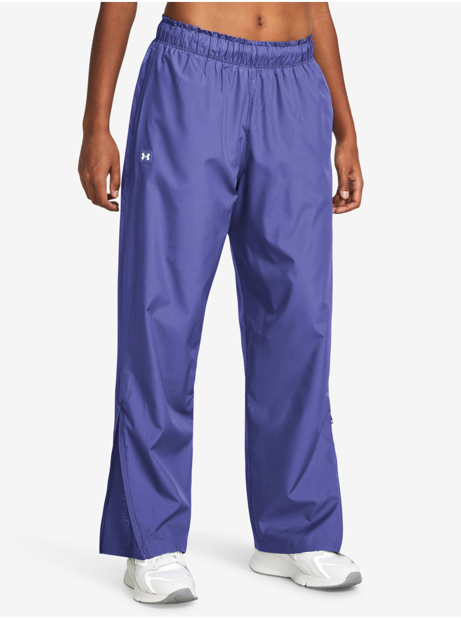 Fialové dámske športové nohavice Under Armour Rush OS Woven Pant