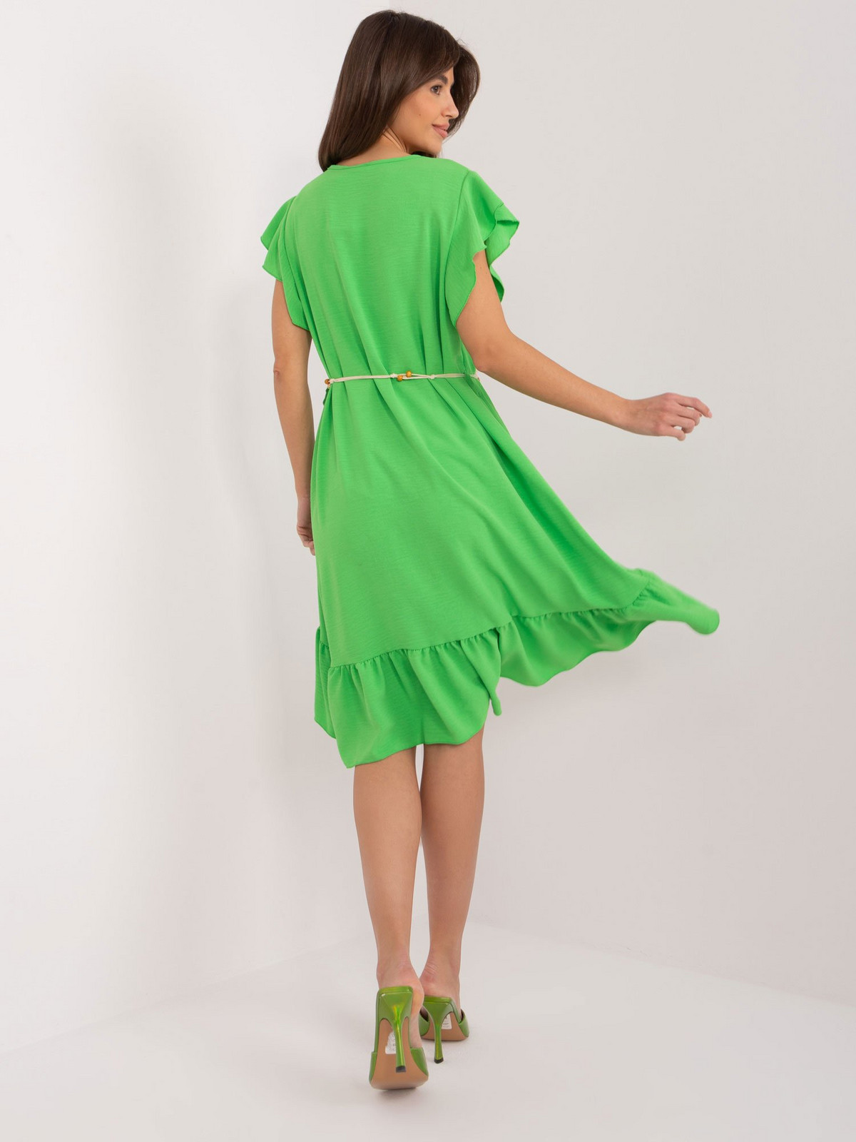 Light green flared dress with ruffles