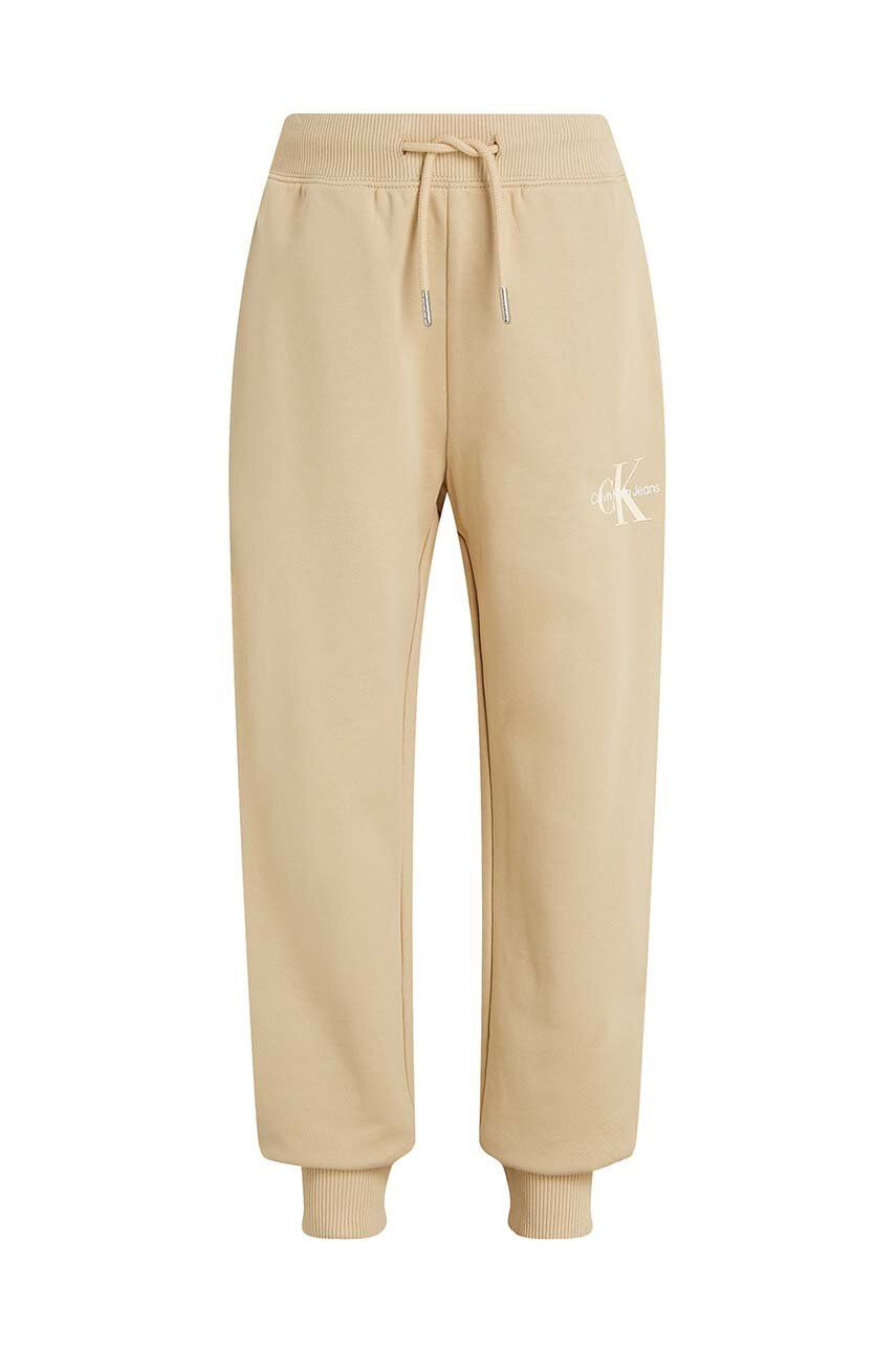 Detské bavlnené tepláky Calvin Klein Jeans MONOGRAM LOGO béžová farba, jednofarebné, IU0IU00285