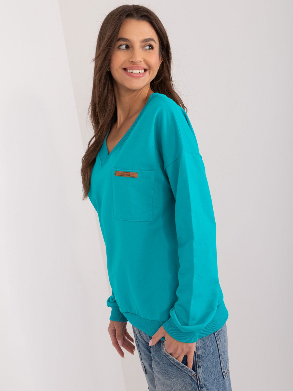 Turquoise plain blouse with long sleeves