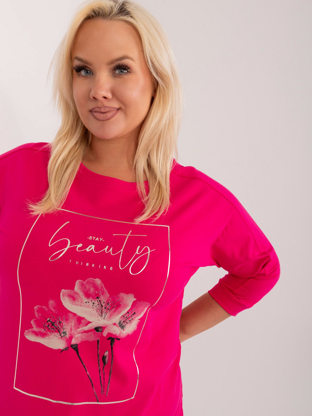 Fuchsia women's plus-size blouse with floral print