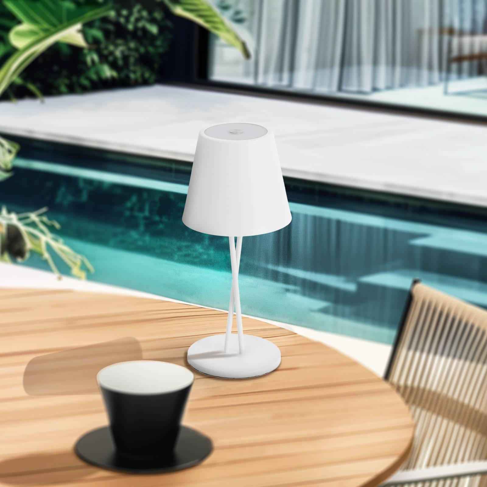 Nabíjacia stolová lampa Lindby LED Janea, biela, prekrížená