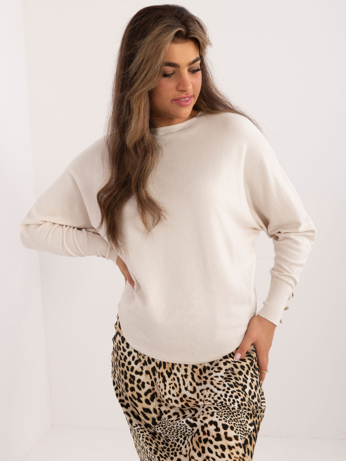 Light beige oversize sweater with long sleeves