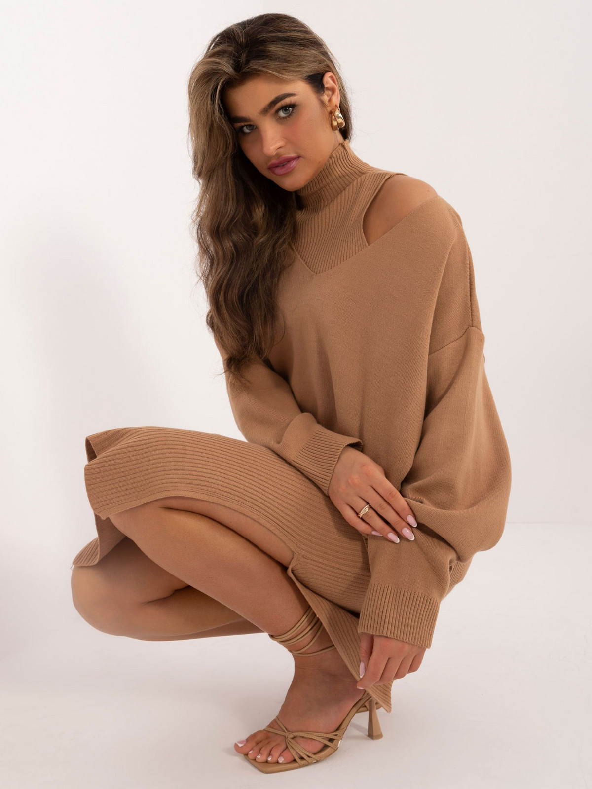 Set of knitted sweater and skirt